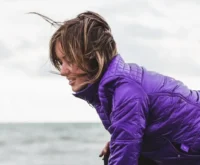 Beautiful athletic woman during workout in autumn
