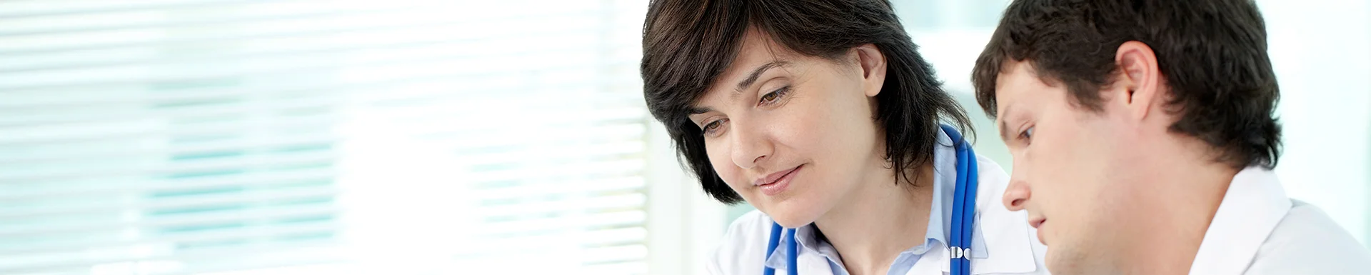 Healthcare practitioners absorbed in a discussion