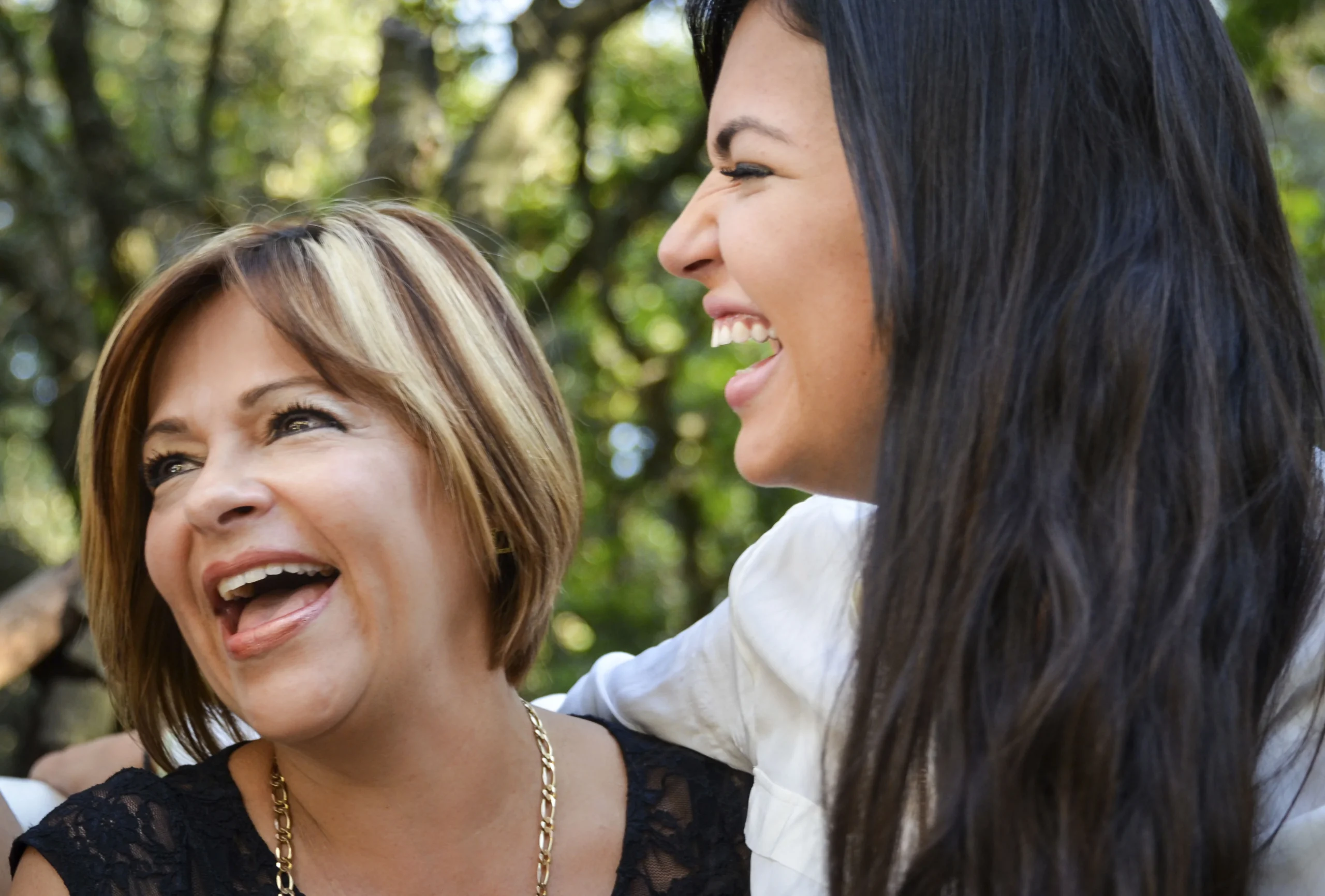Cheerful mother and young daughter
