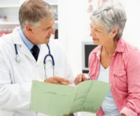 Doctor with female patient