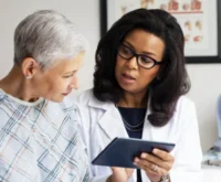 Physician counseling a patient