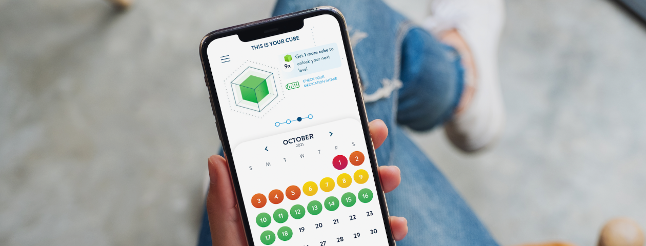 Phone with my acare app on screen