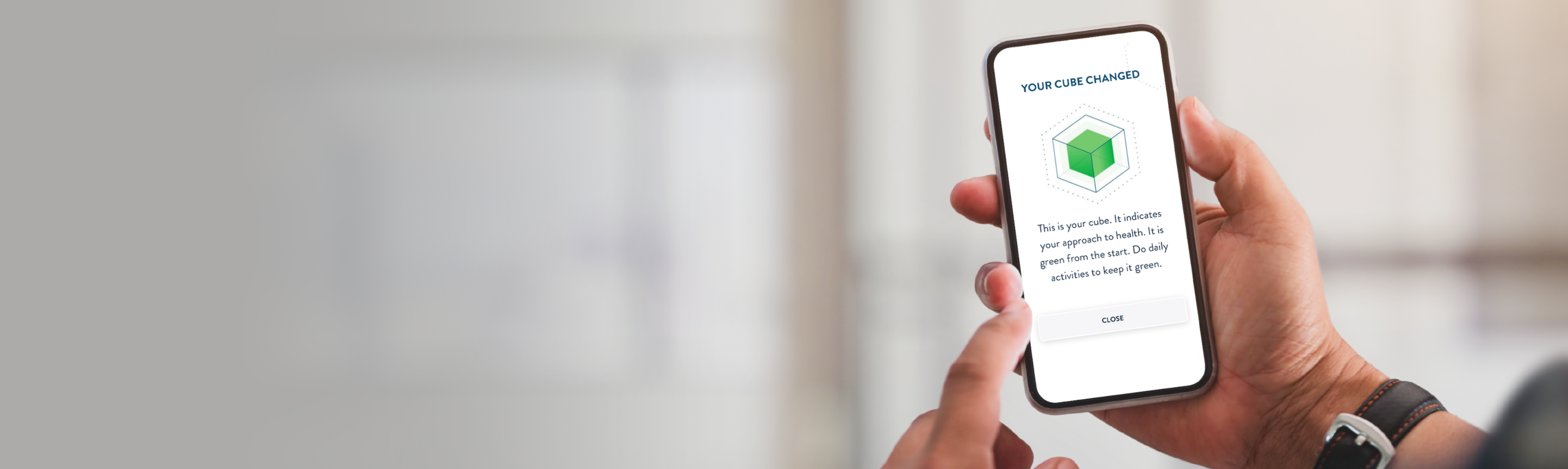 Phone with my acare app on screen