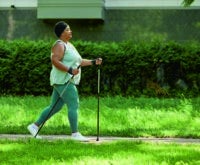 Woman walking outdoors to support cardiometabolic health